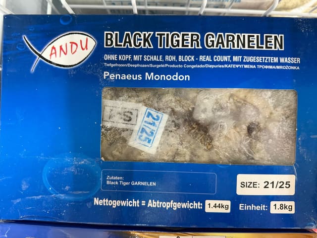 Block frozen black tiger shrimp with head removed and shell on Size 21/25